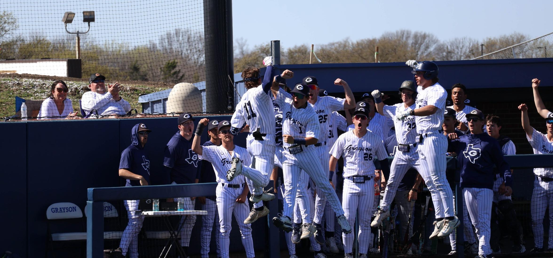 The Grayson Vikings celebrate after a home run ball.